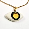 Χειροποίητο κεραμικό κολιέ με σχέδιο μάτι με χρυσό σμάλτο και αλυσίδα από ανοξείδωτο ατσάλι σε χρυσό χρώμα. Mήκος 21εκ.